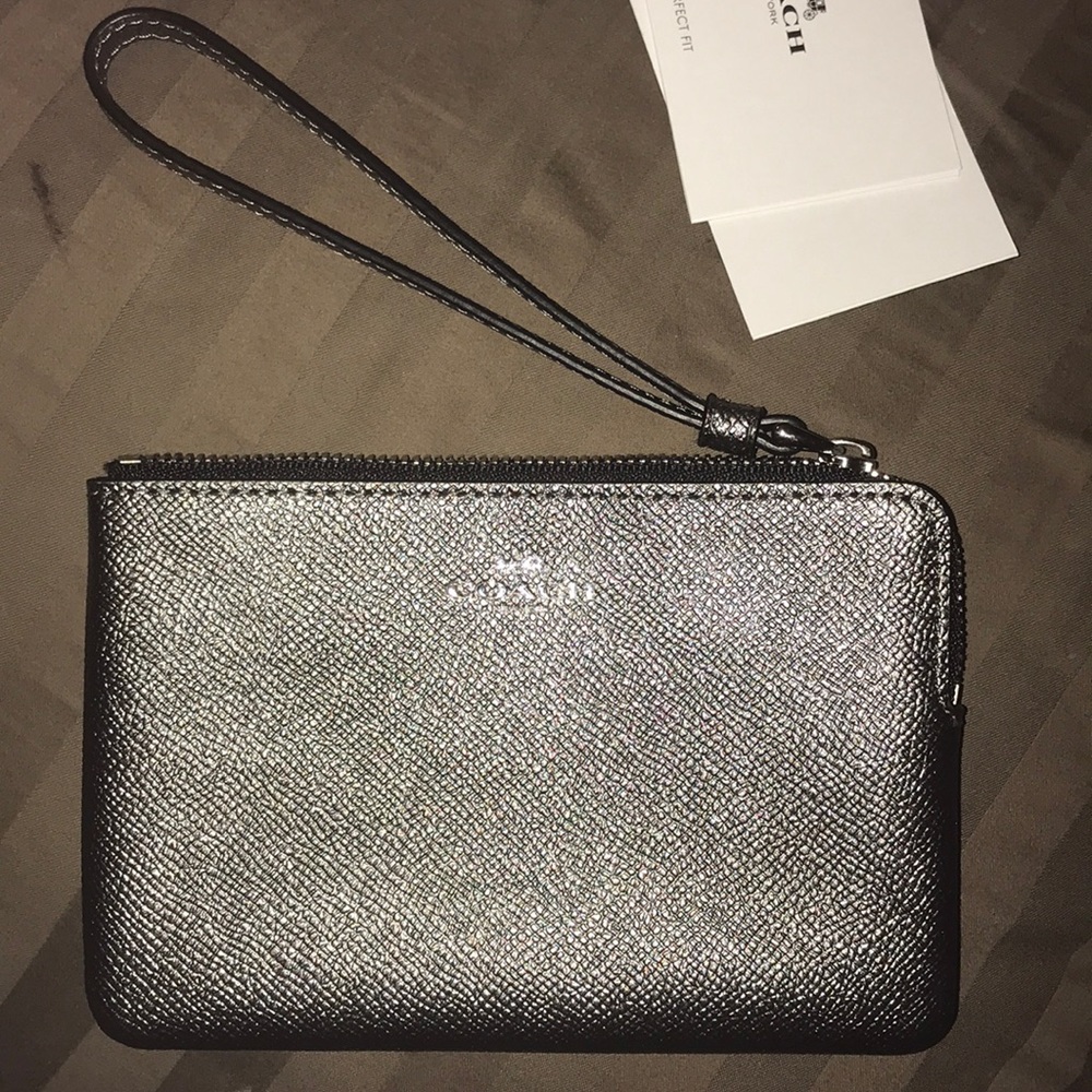 Metallic coach wristlet